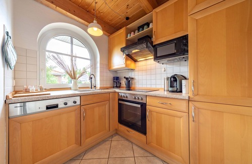 Tannenhausen Casa | Lüttje Huck - Ferienwohnung 3 mit Seeblick & Sauna