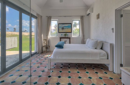 North Palmetto Point Apartamento | La Bougainvillea Boutique Hotel - Suite con vista al jardín