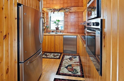 Baie-St-Paul Apartamento | LA CAMPAGNE au centre-ville de Baie St PaulUNIQUE