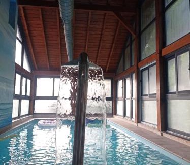 Marron Casa | La Casa Malvarrosa- piscina climatizada