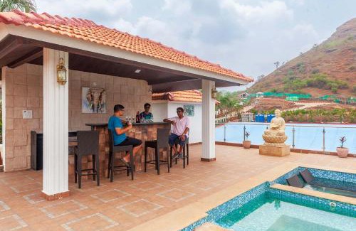 Kune N.m. Villa | La Palm by StayVista - Mountain-view villa, boasting a spacious pool, Gym, Indoor games, Basketball court & A lush lawn with a gazebo