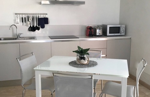 Longa Casa | Lagoon Suites # 3 - Apartamento con jardín privado y vista a la laguna.