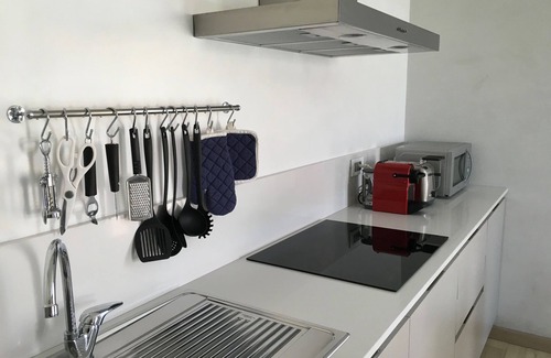 Longa Casa | Lagoon Suites # 3 - Apartamento con jardín privado y vista a la laguna.