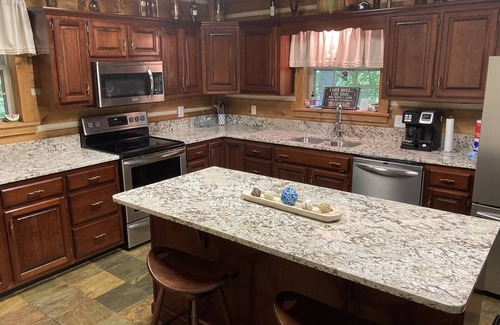 Nancy Cabina | Lake Cumberland cabaña personalizada casa en 32 acres arbolados