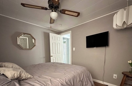 Como Cabaña | Lake Geneva cottage with Lake Como private beach access right down the road.