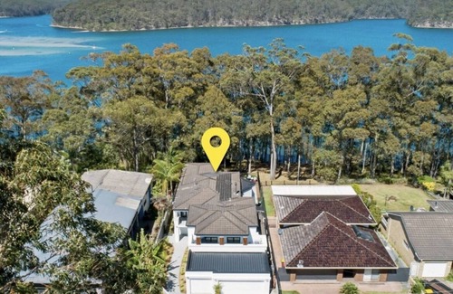 Kings Point Casa | Casa del lago con piscina y sala de teatro