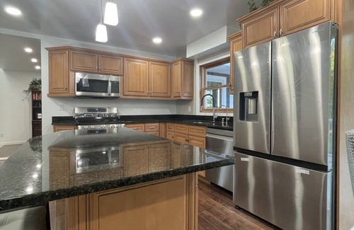 Racine Casa | Lake Michigan Retreat. Spacious 4-bedroom home on wooded lot across from lake.