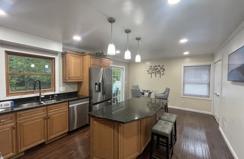 Racine Casa | Lake Michigan Retreat. Spacious 4-bedroom home on wooded lot across from lake.