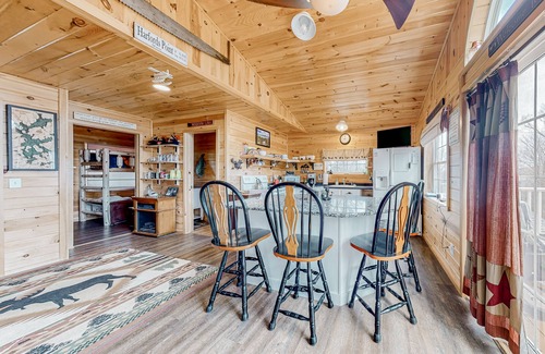 Greenville Junction Casa | Lake-view two-story home with beach access, wood stove, grill, W/D, & fast WiFi