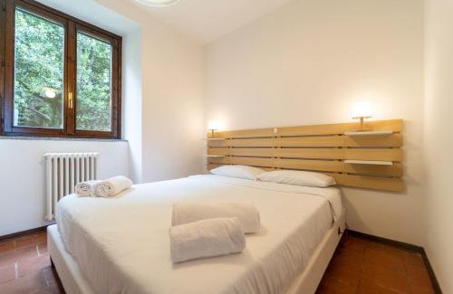 Nesso Apartamento | Lakefront apartment with a view, parking and swimming pool