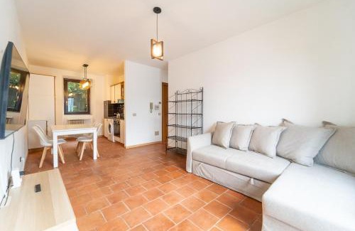 Nesso Apartamento | Lakefront apartment with a view, parking and swimming pool