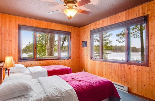 Three Lakes Cabina | Lakefront cabin with lake views, wood stove, hot tubs, heated pool, gym, golf