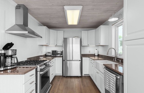 Lake Koshkonong Cabaña | Lakefront Getaway with Hot Tub, Dock, & Game Room - Kosh Kottage