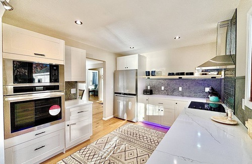 Brooklyn Center Cabaña | Lakefront House w/King Bed, Sauna, walk-in shower and lake access