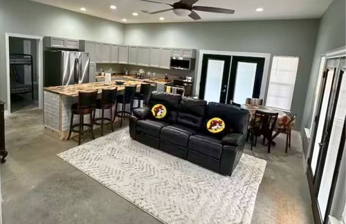 West Livingston Casa | Lakefront retreat with pickleball, boat launch, putting green, pool table & stunning lake views!