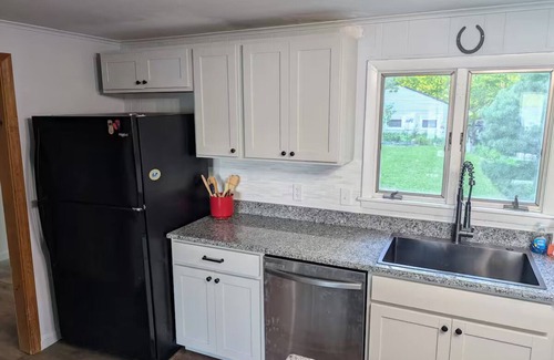 South Casco Casa | Lakehouse with large level yard on pristine Little Sebago Lake