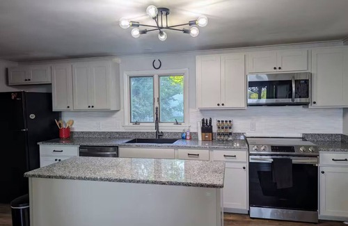 South Casco Casa | Lakehouse with large level yard on pristine Little Sebago Lake