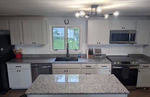 South Casco Casa | Lakehouse with large level yard on pristine Little Sebago Lake