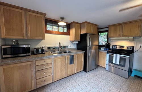 Alton Bay Cabaña | Lakeview, cozy, family, pets, boat slip, beach, trails, skiing, adventures