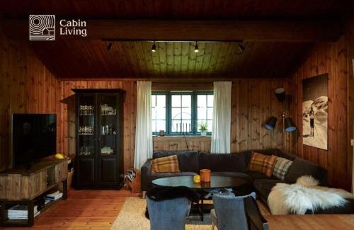 Nes Casa | Large cabin at Nesfjellet with lovely view, inddor Jacuzzi & sauna