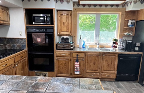 Amberg Casa | Large cottage right on ATV & snow trails. Close to Dave’s Falls! Pet friendly!