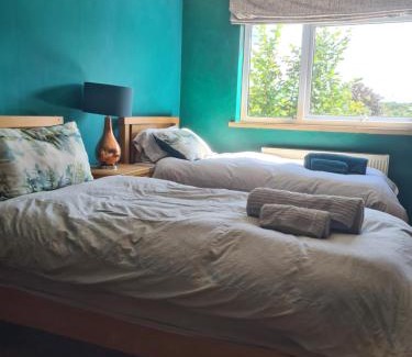 Pill Casa | Large twin room at Fir Tree Lodge, Shirehampton