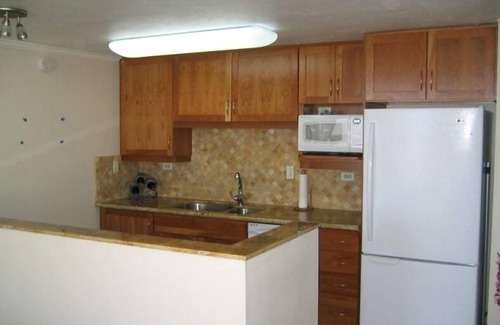 Punaluu Condominio | El patio privado más grande en el océano y aire acondicionado.