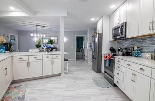 Lochmoor Waterway Estates Casa | "Latitude Adjustment" with Heated Pool and Boat Dock