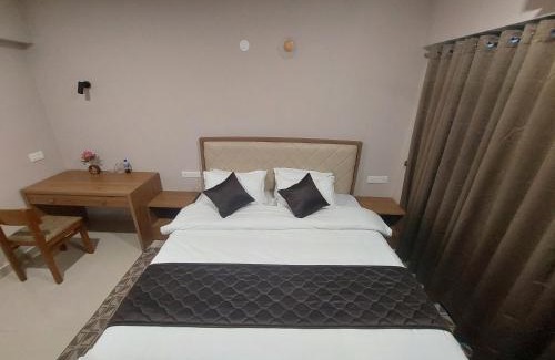 Nedumbassery Apartamento | Lavender Airport suits