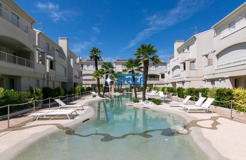 Faro Apartamento | Le Tropezien Village *pool and patio*