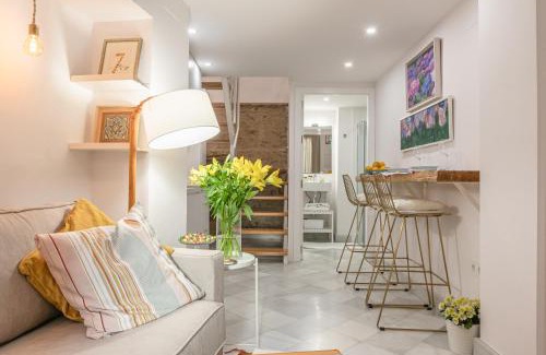 Museo Apartamento | Loft duplex Sevilla wall