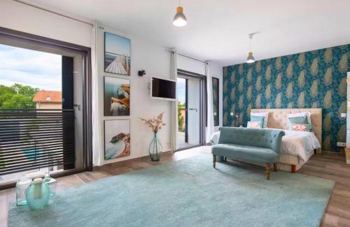 Sorgues Villa | Loft Saint-Hubert - Idéal Familles & Groupes - 10min Avignon et Château-neuf-du-Pape - 5min Gare - Expérience design, conviviale et tout confort - Jardin clos - Parking privé gratuit - Au calme