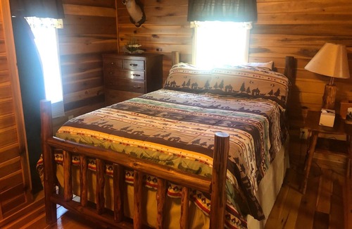 Farmers Casa | Lofty “Musky Cabin” situated on a hill with musky decor, fire ring, and 2 decks!