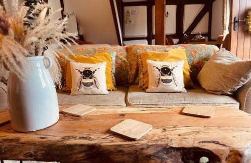 Whitbourne Casa | Log- burner, Hot tub with woodland views Walking trails and local pub on your doorstep! Popular walking trails nearby-Malvern Hills and the Brockhampton Estate- Peaceful village on the border of Hereford and Worcester