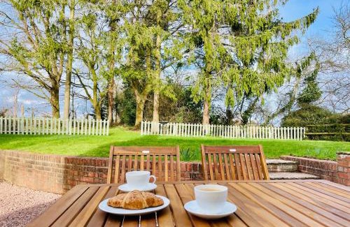 Whitbourne Casa | Log- burner, Hot tub with woodland views Walking trails and local pub on your doorstep! Popular walking trails nearby-Malvern Hills and the Brockhampton Estate- Peaceful village on the border of Hereford and Worcester
