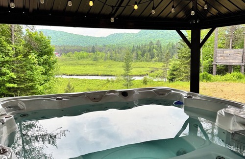 Mauricie Chalet De Esquí | Log cabin | Spa, river & nature, Mauricie