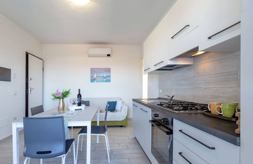 La Muddizza Apartamento | Acogedor apartamento para 5 personas con A/C, TV, terraza y mascotas permitida
