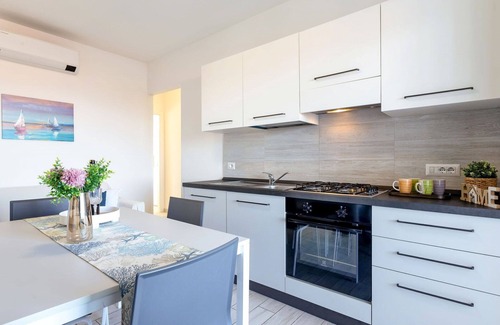 La Muddizza Apartamento | Acogedor apartamento para 5 personas con A/C, TV, terraza y mascotas permitida