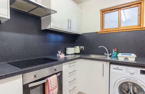 Balloch Apartamento | Hermoso apartamento para 4 personas con WIFI, TV y patio