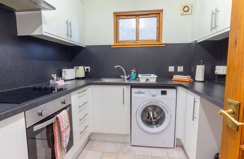 Balloch Apartamento | Hermoso apartamento para 4 personas con WIFI, TV y patio