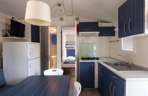 Fertilia Casa | Bonito apartamento en villa para 4 personas con piscina, WIFI, A/C, TV, terraza y mascotas permitida