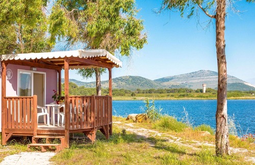 Fertilia Casa | Bonito apartamento en villa para 4 personas con piscina, WIFI, A/C, TV, terraza y mascotas permitida