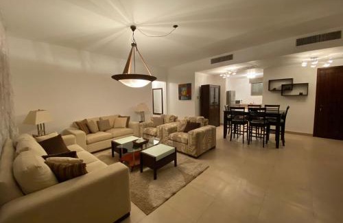 Aqaba Apartamento | Lovely first floor tow bed rooms overviewing circular pool for families only in Talabay Aqaba