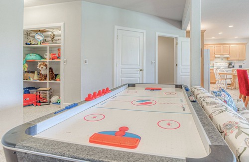 Clinton Casa | Lower-level suite with deck/veranda, garden views, & foosball