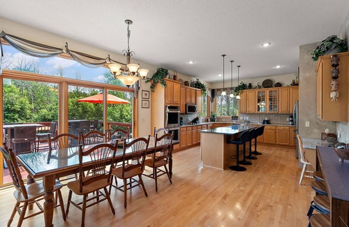 Lakeville Casa | Lux Retreat on 5 Wooded Acres-Pool/Hot Tub/Tiki Bar/Game Room- Great for Groups!