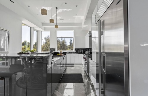 Woodland Hills Villa | Luxe 8000 sqft w/ 2 Pools, Sauna, Putting Green, Game Room | Alta Vista Estate