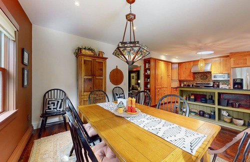 Warren Casa | Luxe custom home with hot tub, game room, & beautiful garden