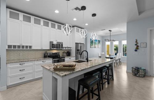 Fort Pierce Casa | Luxurious 4-Bedroom Pool Home -Walk to Beach & Restaurants