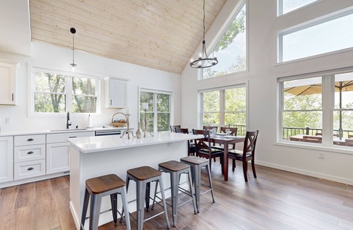 Eastman Casa | Luxurious home with hot tub, electric fireplace, and stunning views