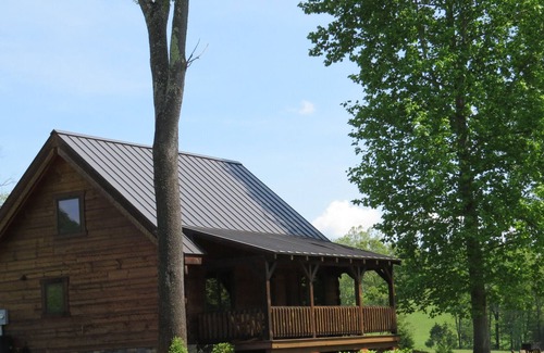 Faber Cabina | Cabaña de madera de lujo en 200 acres con vistas al lago privado.